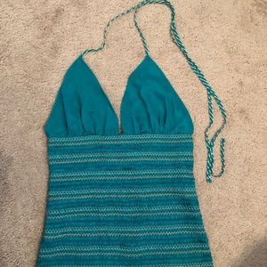 Turquoise tie back halter top.